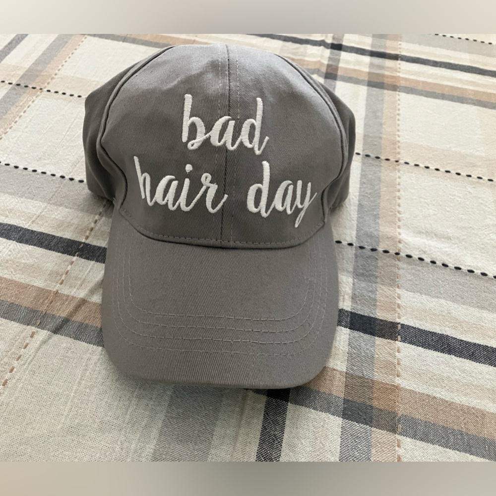 Women’s cc hat new w/o tags gray in color bad hair day imprint Velcro back